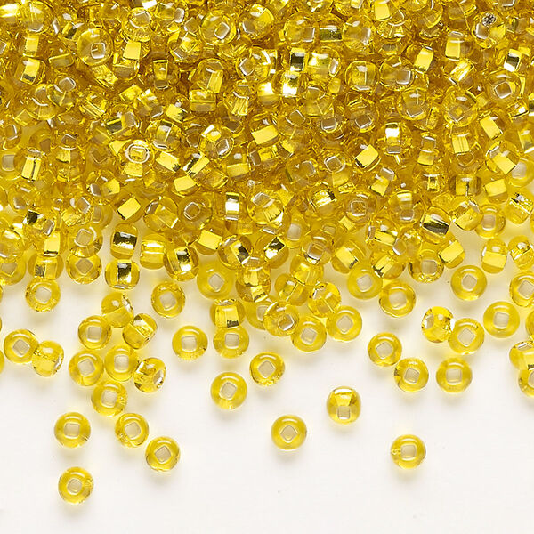 Seed bead, Preciosa Ornela Czech glass, pkg/50g, #8 rocaille, transparent silver-lined yellow amber, (87010). image number 0