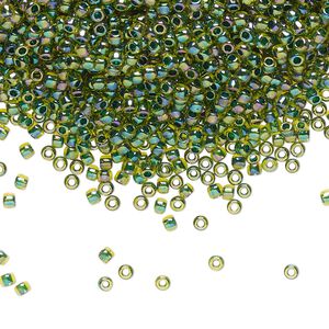 Seed bead, TOHO BEADS®, glass, pkg/50g, #11 round, translucent rainbow forest green-lined jonquil (TR-11-1829).