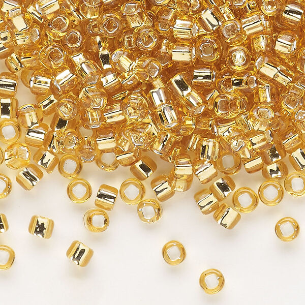 Seed bead, Dyna-Mites™, glass, silver-lined translucent medium gold, #6 round with square hole. Sold per 1/2 kilogram pkg. image number 0