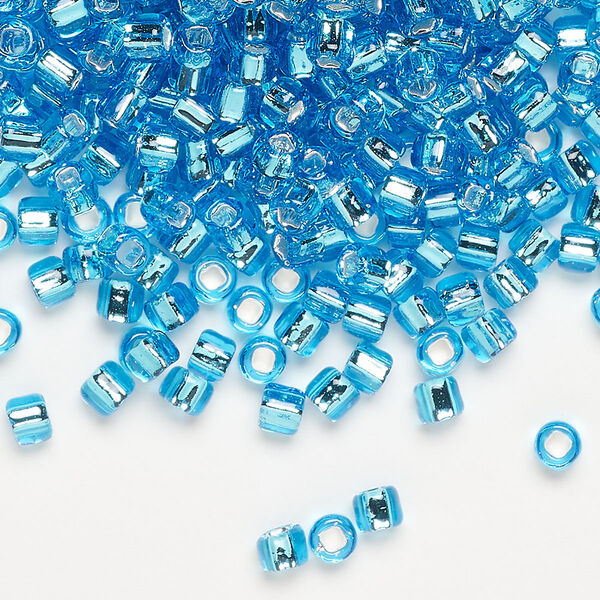 Seed bead, Dyna-Mites™, glass, silver-lined translucent aqua, #6 round with square hole. Sold per 40-gram pkg. image number 0