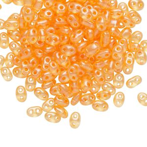 Seed bead, Preciosa Twin™ Czech glass, pkg/250g, 5x2.5mm oval, transparent peach terra pearl clear, (08392).