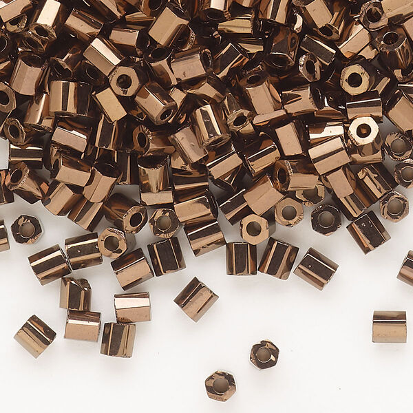 Seed bead, Dyna-Mites™, glass, opaque iris bronze, #6 hex 2-cut. Sold per 1/2 kilogram pkg. image number 0