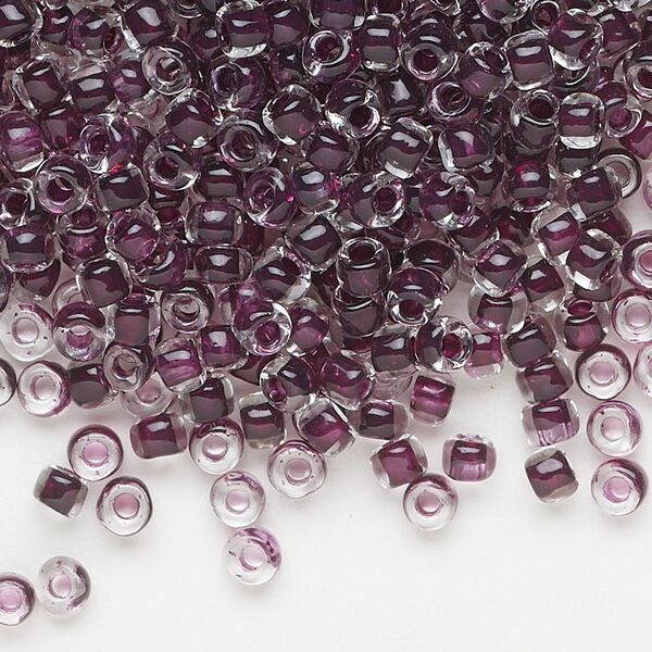 Seed bead, Dyna-Mites™, glass, translucent inside color dark mauve, #6 round. Sold per 40-gram pkg. image number 0