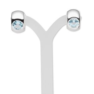 Earring, sky blue topaz (irradiated) and sterling silver, 15x9mm round hoop with 6mm faceted round and hinged closure. Sold per pair.