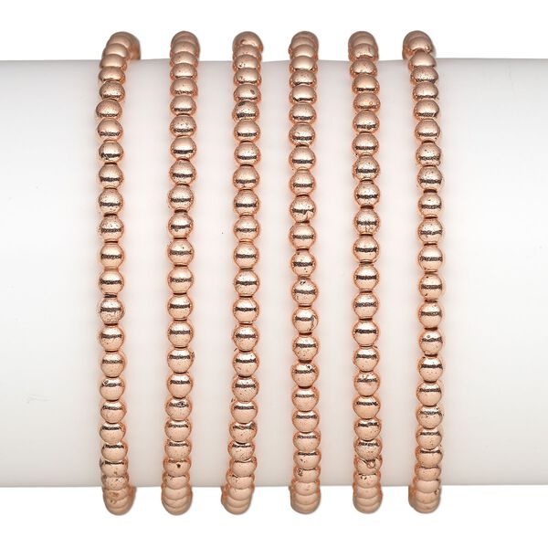 Bracelet, stretch, copper-coated plastic, 4mm round, 7 inches. Sold per pkg of 6. image number 0