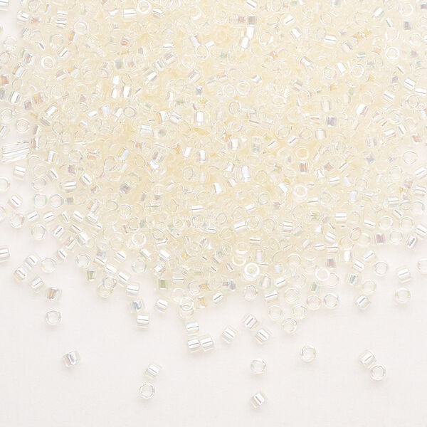 Seed bead, Delica®, glass, pkg/7.5g, #11 round, translucent rainbow glazed luster crystal ivory (DB-0109). image number 0