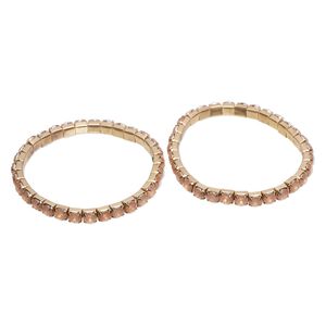 Bracelet, stretch, acrylic and gold-finished steel, frosted peach, 6-7mm wide, 7-1/2 inches. Sold per pkg of 2.