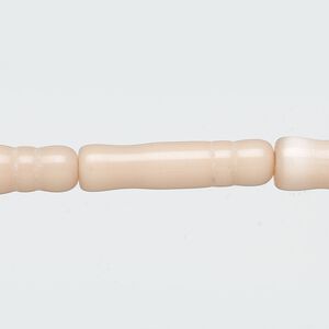 Bead, cat's eye glass (fiber optic glass), light peach, 25x6mm-26x8mm textured round tube. Sold per 15-inch strand.