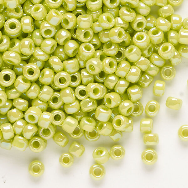Seed bead, Dyna-Mites™, glass, opaque rainbow light green, #6 round. Sold per 40-gram pkg. image number 0