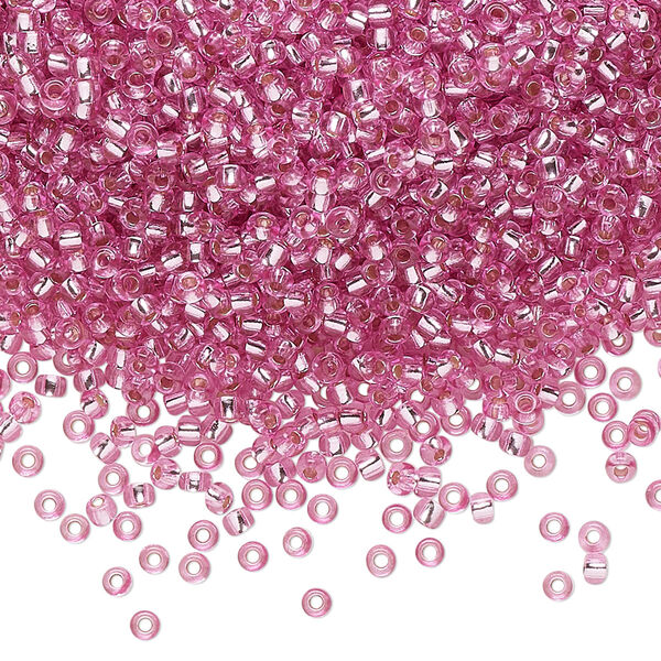 Seed bead, Preciosa Ornela Czech glass, pkg/50g, #11 rocaille, translucent solgel dyed silver-lined pink, (78192). image number 0