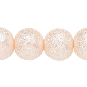 Bead, glass, opaque medium pink, 16mm textured round. Sold per 15-1/2" to 16" strand.