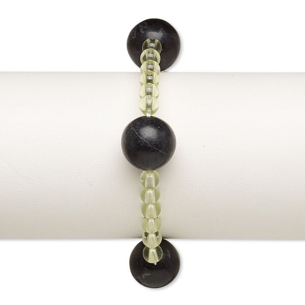 Bracelet, stretch, blackstone (dyed) and acrylic, light green, 5mm and 15-16mm round, 6 inches. Sold individually. image number 0