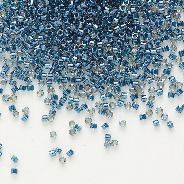 Seed bead, Delica®, glass, pkg/7.5g, #11 round, translucent blue-lined luster topaz (DB-0921). image number 0