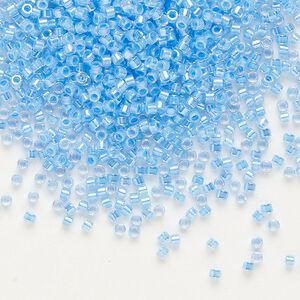 Seed bead, Delica®, glass, pkg/7.5g, #11 round, translucent light blue-lined rainbow crystal clear (DB-0076).