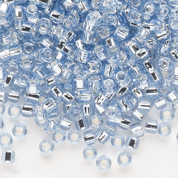 Seed bead, Dyna-Mites™, glass, silver-lined translucent pale blue, #6 round with square hole. Sold per 1/2 kilogram pkg. image number 0