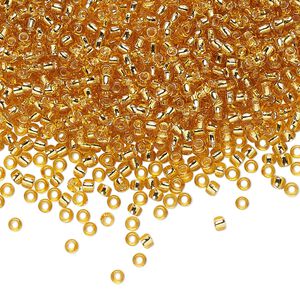 Seed bead, TOHO BEADS®, glass, pkg/7.5g, #11 round, transparent silver-lined medium topaz (TR-11-22B).