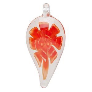 Focal, lampworked glass, transparent clear / opaque orange / opaque white, 40x24mm-48x27mm teardrop with flower. Sold individually.