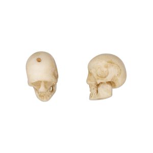 Bead, bone (dyed), pkg/1, antiqued, 12x7mm-14x9mm skull.