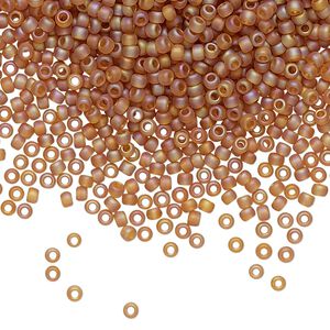 Seed bead, TOHO BEADS®, glass, pkg/250g, #11 round, translucent rainbow frosted dark topaz (TR-11-162CF).