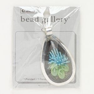 Pendant, silver-finished brass and lampworked glass, black / blue / green, 57x37mm teardrop with flower and green-colored foil. Sold individually.