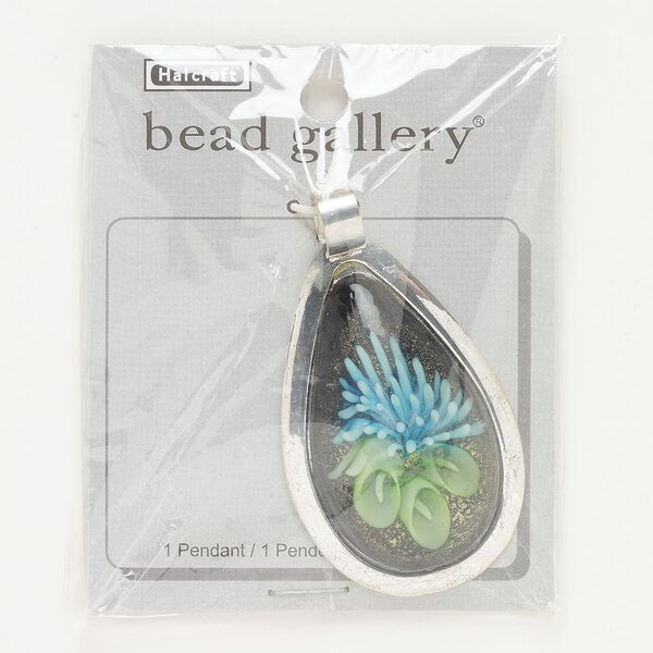 Pendant, silver-finished brass and lampworked glass, black / blue / green, 57x37mm teardrop with flower and green-colored foil. Sold individually. image number 0