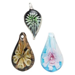 Random focal mix, lampworked glass, pkg/3,  38x17mm-60x31mm mixed shapes with flower, opaque and translucent mixed colors with silver-colored foil and copper-colored glitter.