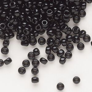 Seed bead, Dyna-Mites™, glass, opaque black, #6 round. Sold per 1/2 kilogram pkg.