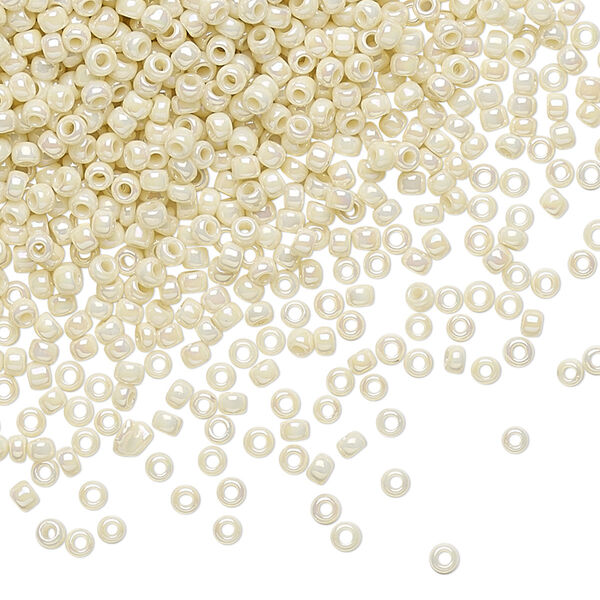 Seed bead, TOHO BEADS®, glass, pkg/7.5g, #11 round, opaque rainbow light beige (TR-11-409). image number 0