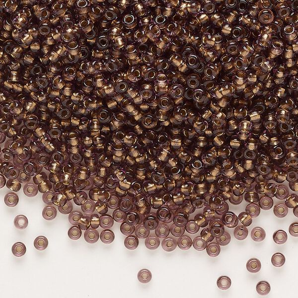 Seed bead, glass, pkg/50g, #10 rocaille, transparent color-lined bronze amethyst. image number 0