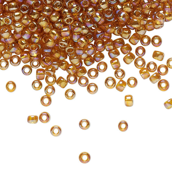 Seed bead, TOHO BEADS®, glass, pkg/50g, #8 round, translucent rainbow topaz (TR-08-162C). image number 0