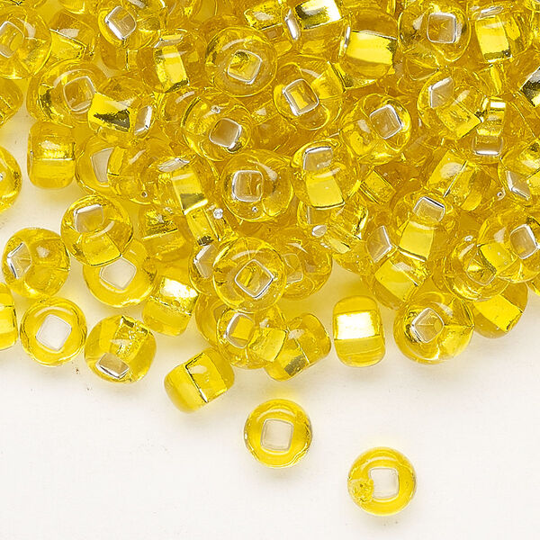 Seed bead, Preciosa Ornela, glass, transparent silver-lined yellow amber, #2 rocaille with square hole. Sold per 50-gram pkg. image number 0