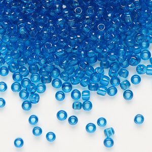 Seed bead, Dyna-Mites™, glass, transparent turquoise blue, #8 round. Sold per 1/2 kilogram pkg.