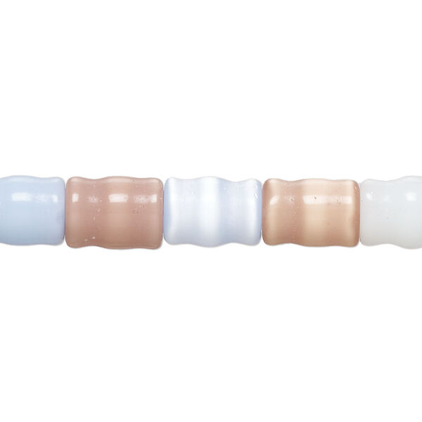 Bead, cat's eye glass (fiber optic glass ), mixed colors, 10x6mm-10x8mm carved tube. Sold per 14-inch strand, approximately 35 beads. image number 0