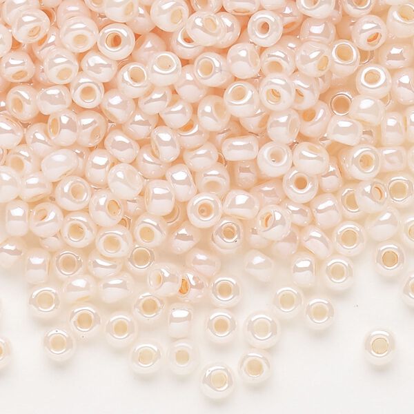Seed bead, Dyna-Mites™, glass, opaque ceylon pastel peach, #6 round. Sold per 1/2 kilogram pkg. image number 0