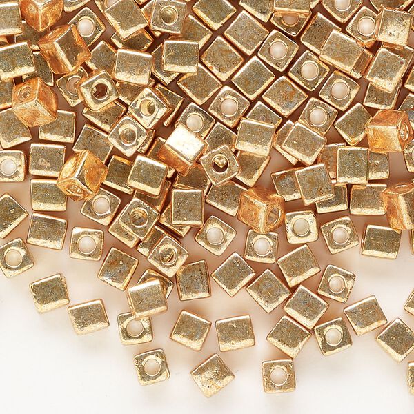 Seed bead, Miyuki, glass, pkg/250g, 3.5-3.7mm square, opaque metallic gold (SB-1053). image number 0