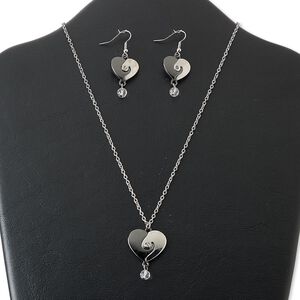 Necklace and earring set, glass / gunmetal- / imitation rhodium-finished steel / "pewter" (zinc-based alloy), clear, 25mm heart, 18 inches with 3-inch extender chain and lobster claw clasp, 3/4 inch earrings with fishhook ear wire. Sold per set.