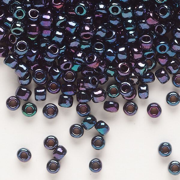 Seed bead, Dyna-Mites™, glass, opaque iris blue, #6 round. Sold per 1/2 kilogram pkg. image number 0