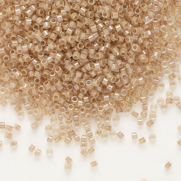 Seed bead, Delica®, glass, pkg/50g, #11 round, translucent blush-lined luster crystal clear (DB-0069). image number 0