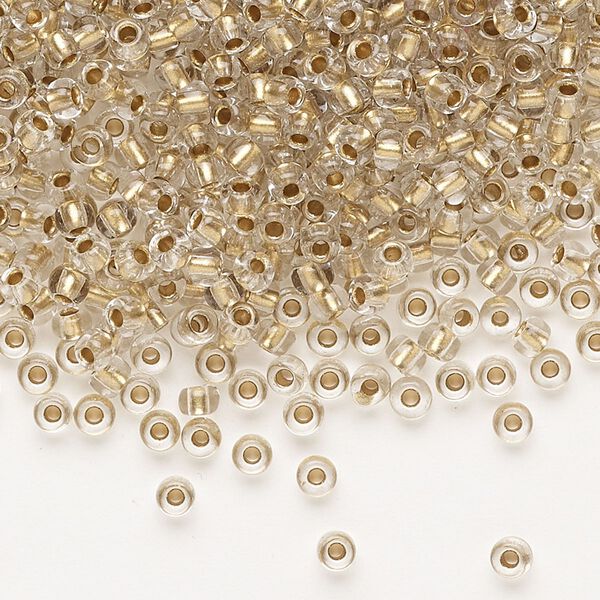 Seed bead, Preciosa Ornela Czech glass, pkg/500g, #8 rocaille, transparent metallic bronze-lined clear, (68106). image number 0
