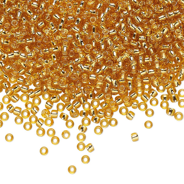 Seed bead, TOHO BEADS®, glass, pkg/50g, #11 round, transparent silver-lined medium topaz (TR-11-22B). image number 0