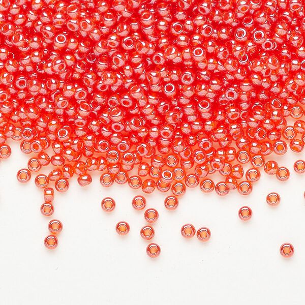 Seed bead glass pkg/50g #11 round, translucent luster light red | Fire Mountain Gems and Beads image number 0
