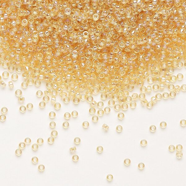 Seed bead, Miyuki, glass, pkg/35g, #15 rocaille, translucent rainbow light topaz (RR-251). image number 0