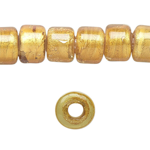 Bead, lampworked glass, semitransparent gold with fine silver foil, 12x8mm crow. Sold per 15-1/2" to 16" strand. image number 0