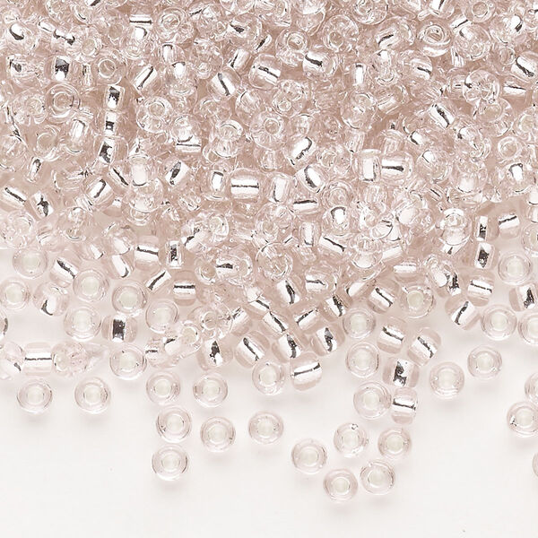 Seed bead, Dyna-Mites™, glass, silver-lined translucent light pink, #8 round. Sold per 1/2 kilogram pkg. image number 0