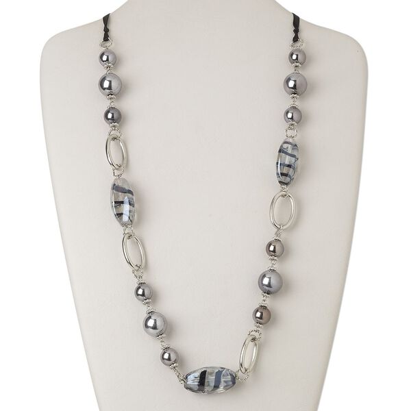 Necklace, acrylic / ribbon / glass / silver-coated plastic / silver-finished steel, black / clear / blue, oval, 54 inches with tie closure. Sold individually. image number 0