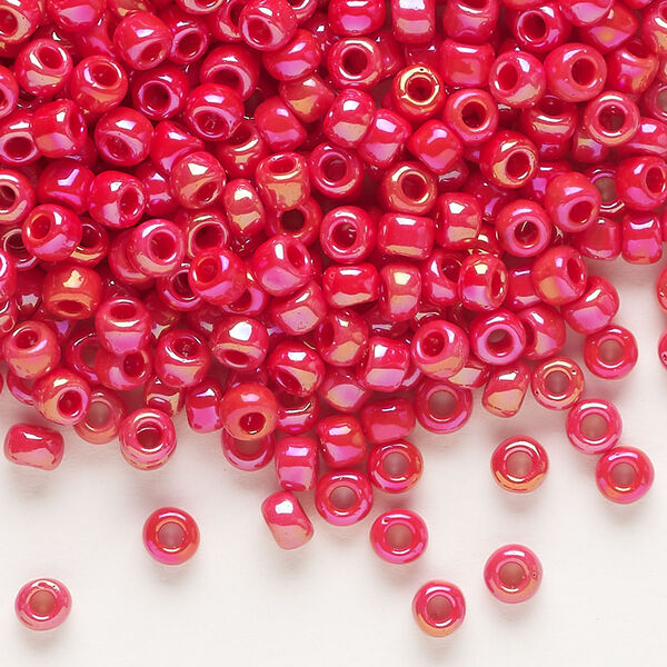 Seed bead, Dyna-Mites™, glass, opaque rainbow ruby red, #6 round. Sold per 40-gram pkg. image number 0