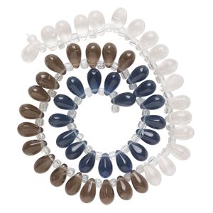 Bead, glass, transparent clear, dark blue and smoke, 11x7mm top-drilled teardrop with irregular rondelles. Sold per 14-inch strand.
