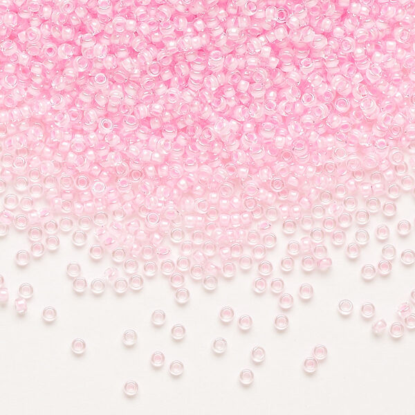 Seed bead, Miyuki, glass, pkg/35g, #15 rocaille, translucent pink-lined luster crystal clear (RR-207). image number 0