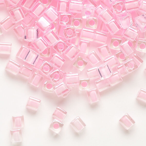 Seed bead, Miyuki, glass, pkg/250g, 3.5-3.7mm square, transparent pink inside dyed color clear (SB-207). image number 0