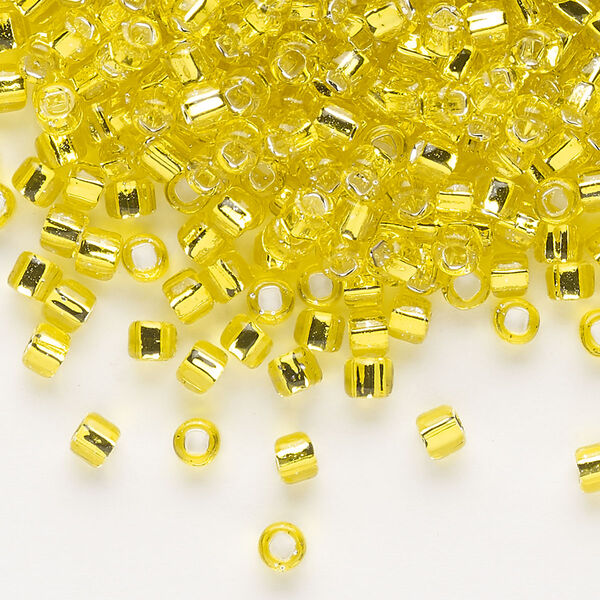 Seed bead, Dyna-Mites™, glass, silver-lined translucent yellow, #6 round with square hole. Sold per 40-gram pkg. image number 0
